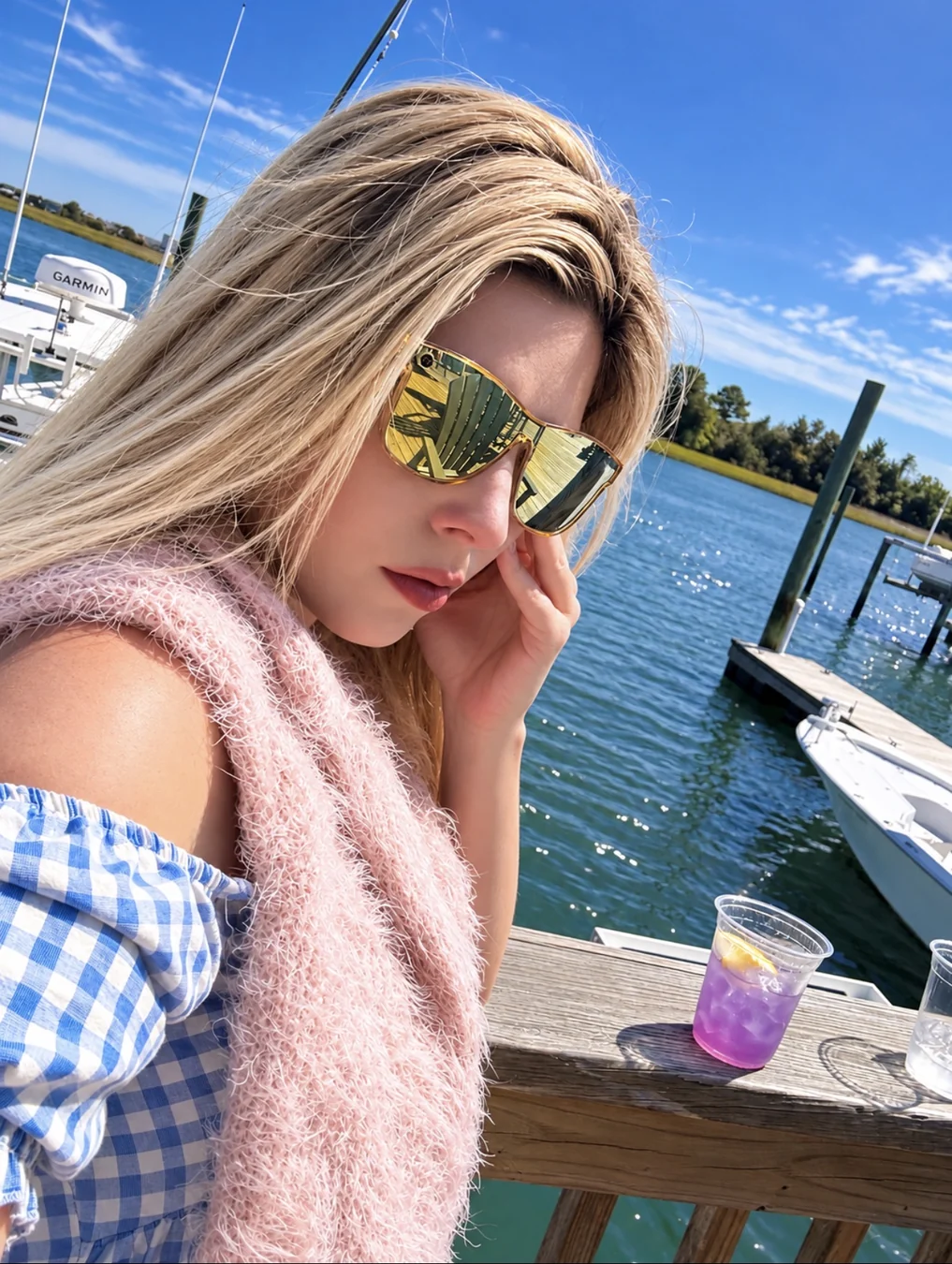 Jennifer by the water on a bright sunny day